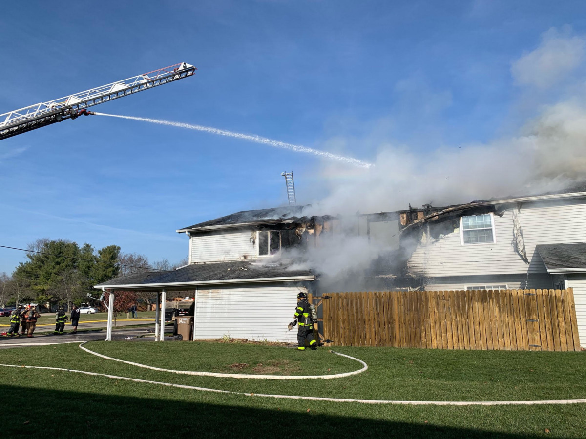 Columbus firefighters are at the scene of a structure fire at the Two Worlds Condominium Complex off Midway Street in Columbus. Photo by Mike Wolanin | The Republic